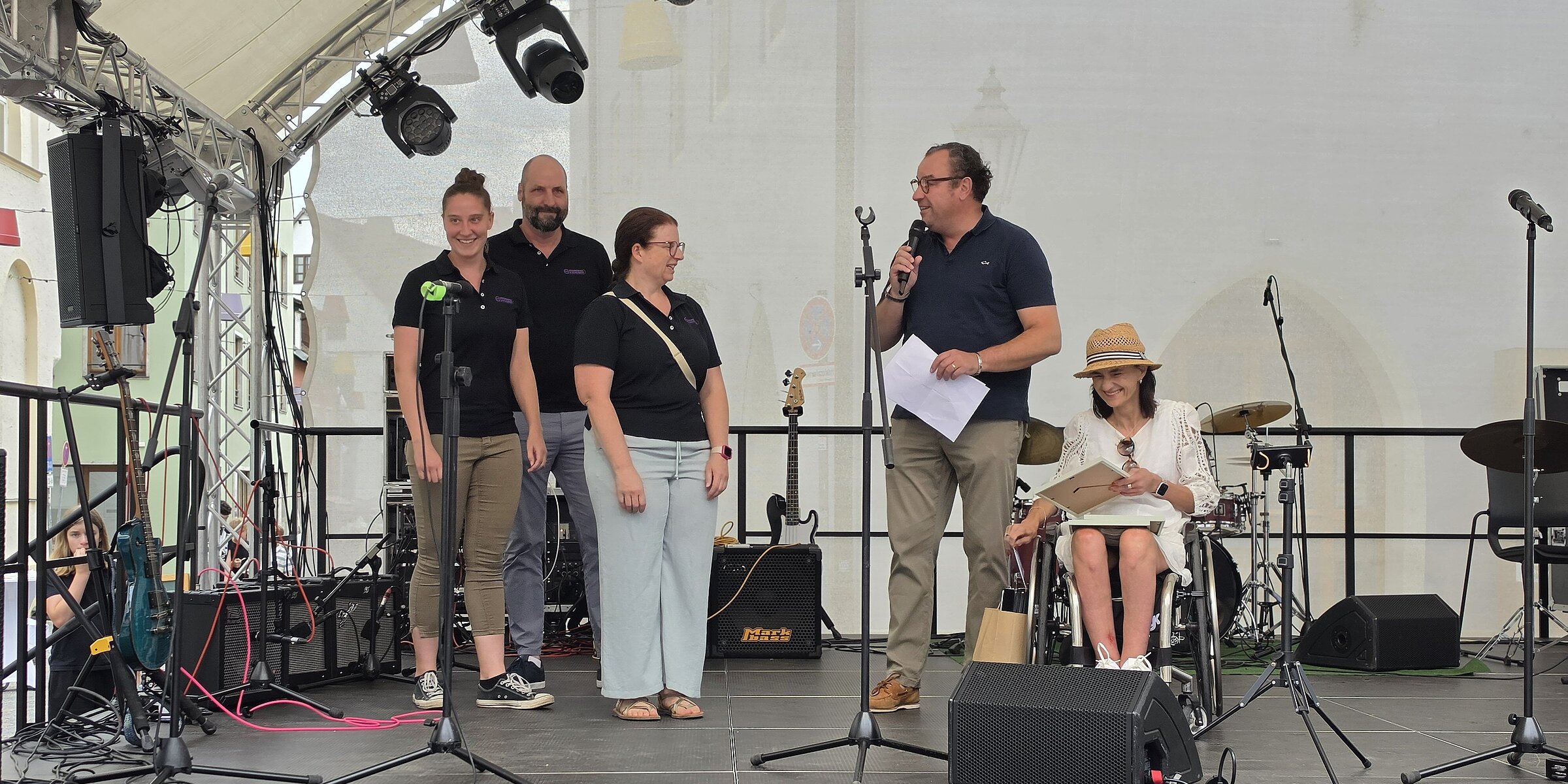 Kroschu employees on stage during the awards ceremony.