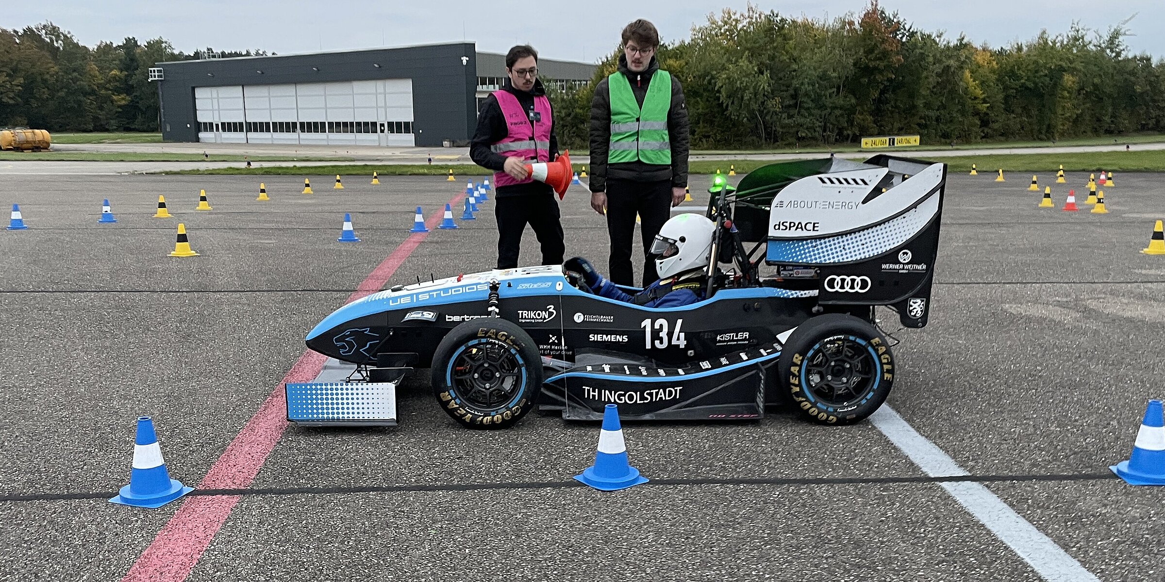 Racing car in starting position on the track